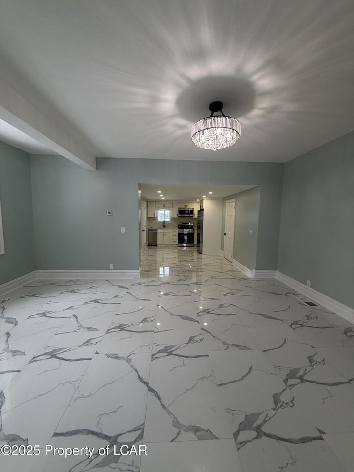 1144 Academy St - Photo 4 of 10