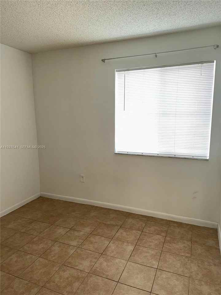 4708 Nw 114th Ave #104-3 - Photo 2 of 19