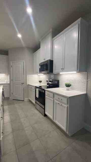 11620 61st St E - Photo 7 of 32