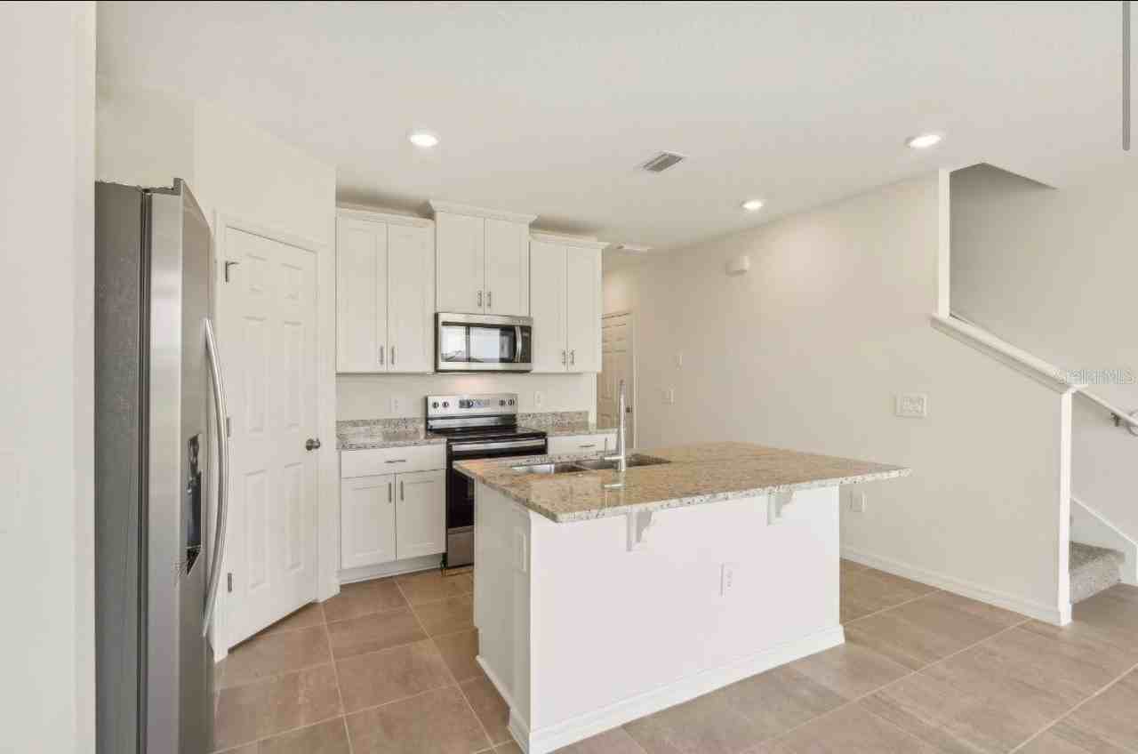 16390 Bird Of Paradise Ave - Photo 6 of 34