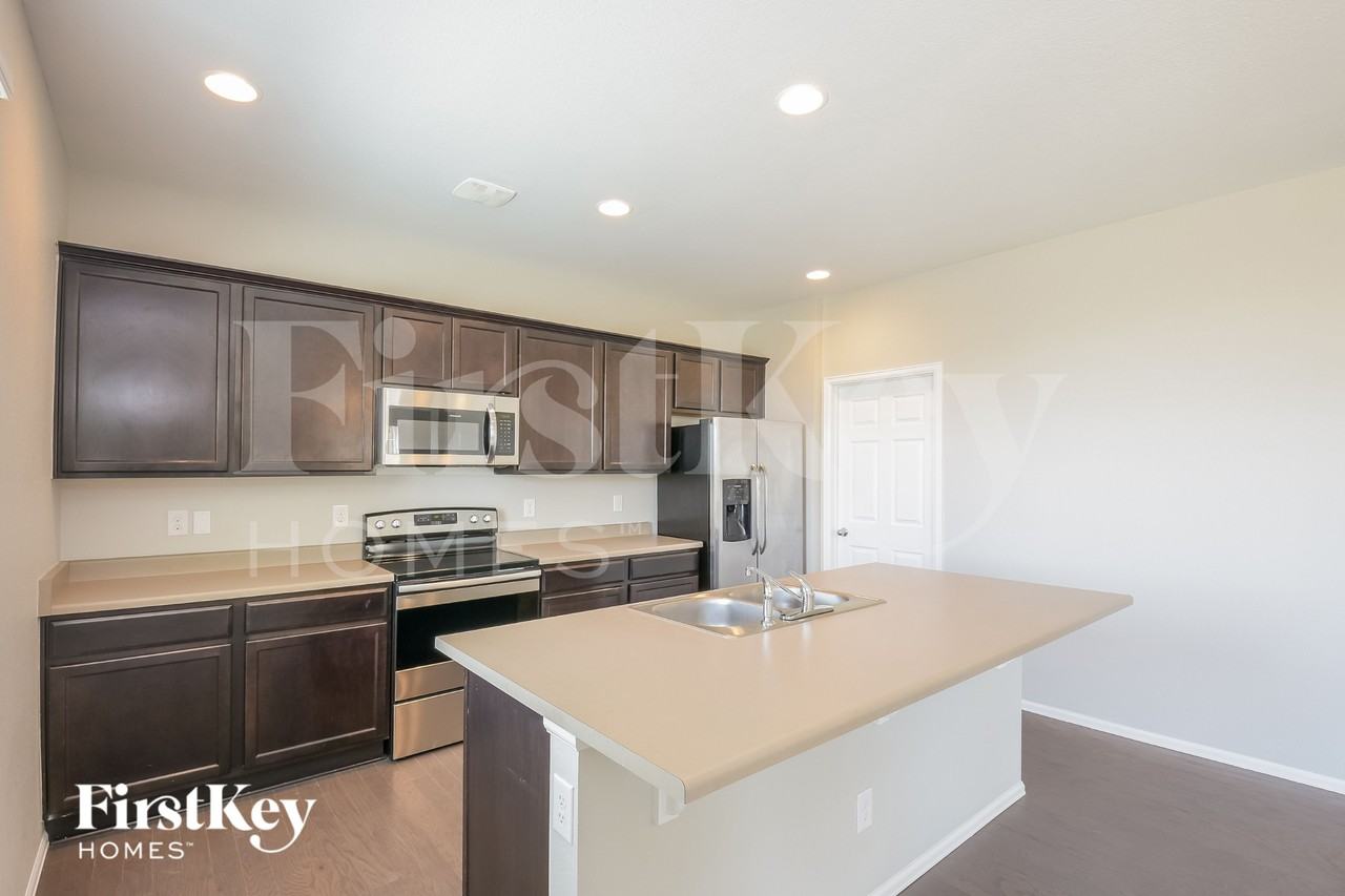 6481 N Dunkirk Ct - Photo 6 of 15