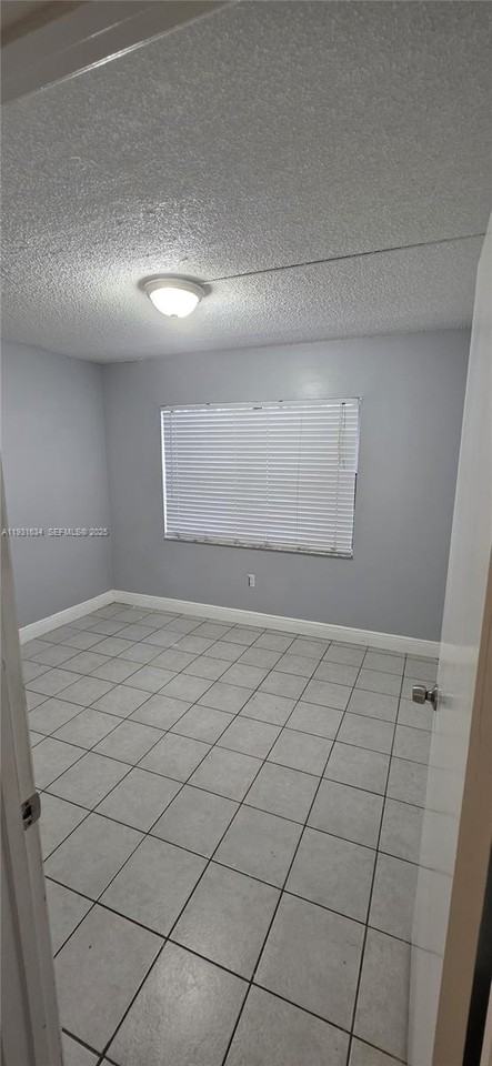 10006 Nw 6th St #101 - Photo 2 of 8