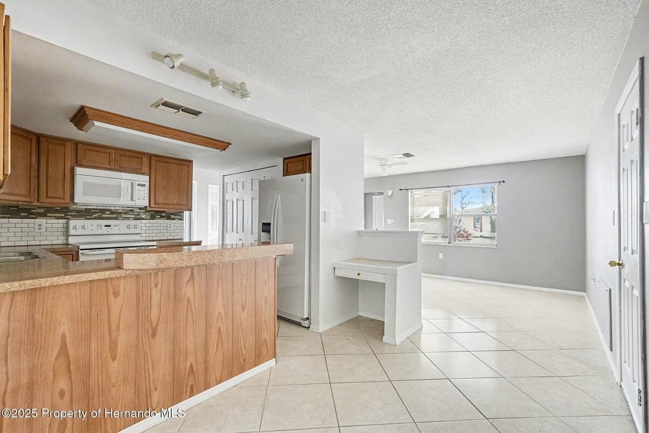 9931 Woodstock Ln - Photo 7 of 16