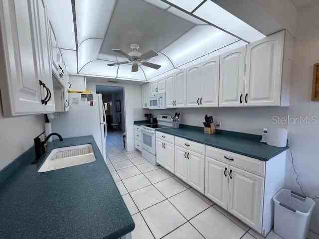 19 Whispering Sands Dr #106 - Photo 3 of 34