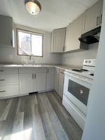 featured image of 8817 102 Ave. Village St. John #8817