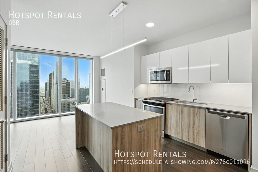 313 W Wolf Point Plz