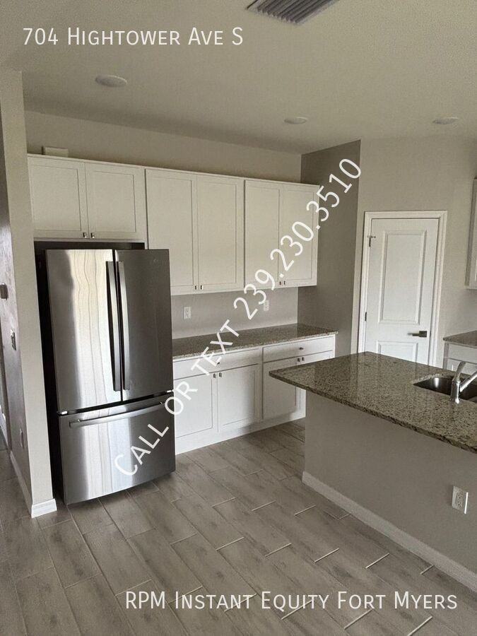 704 Hightower Ave S - Photo 3 of 13