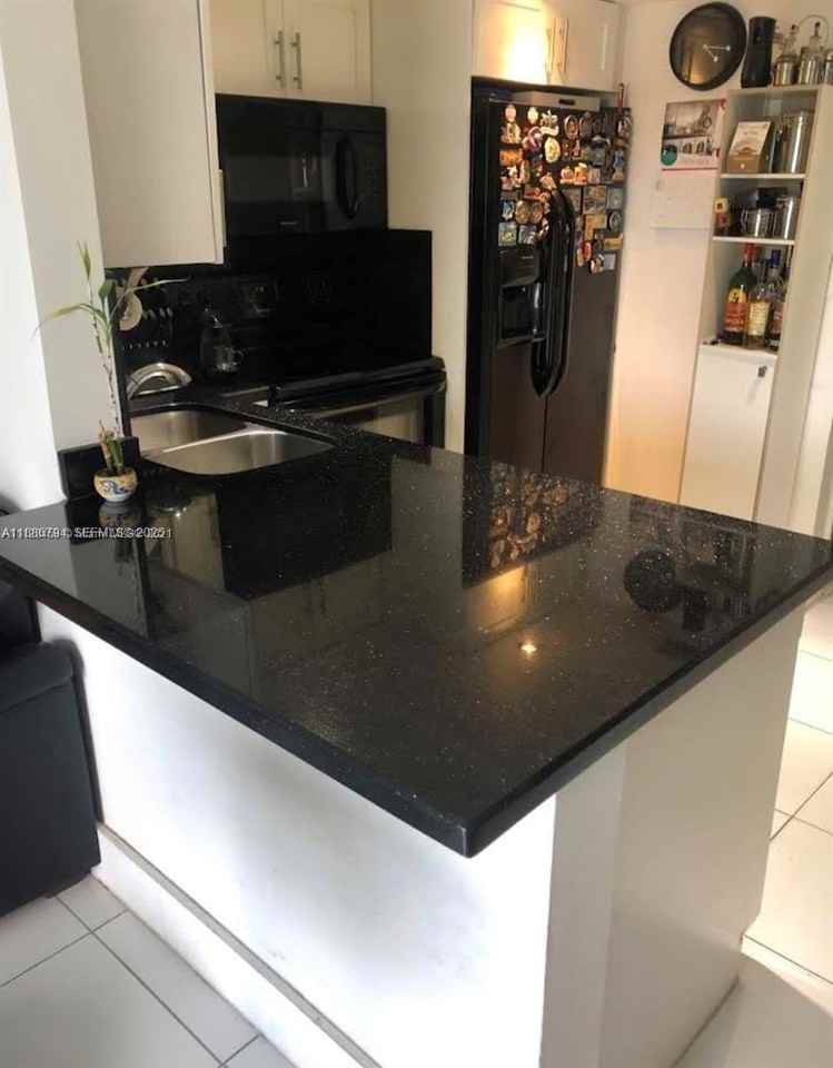 3868 Ne 169th St #302 - Photo 4 of 14