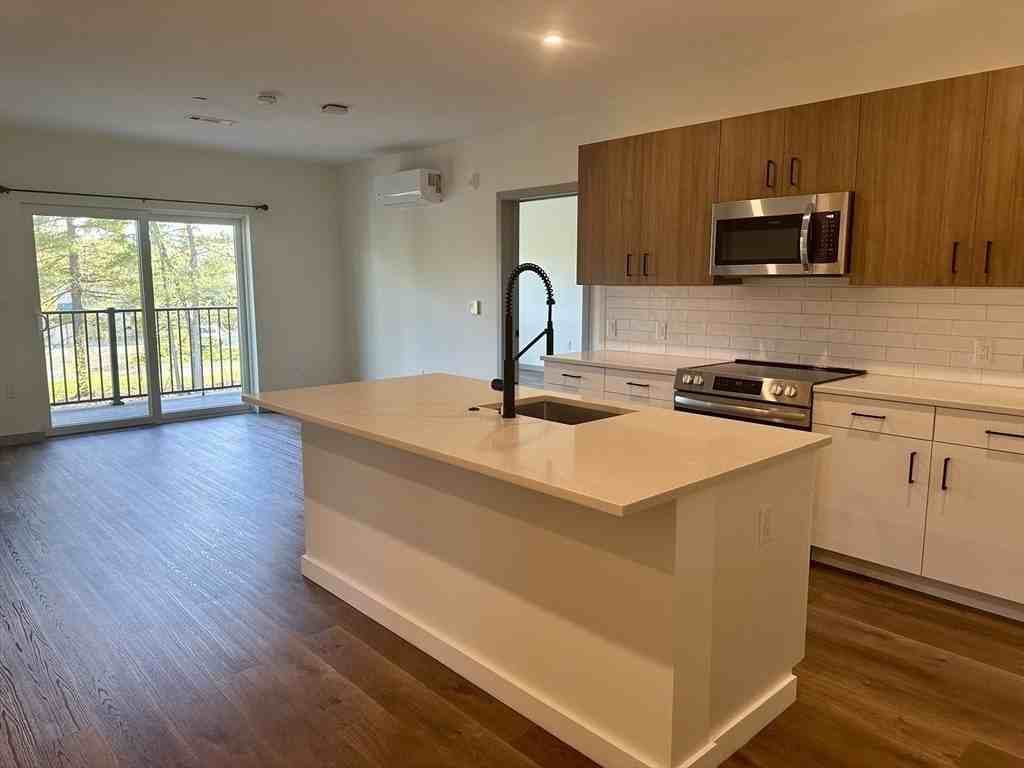 203 Lowell St Unit 105 #105 - Photo 3 of 14