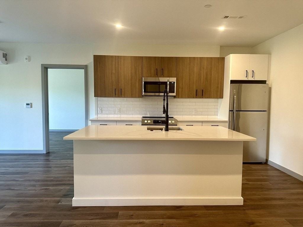 203 Lowell St Unit 105 #105 - Photo 4 of 14