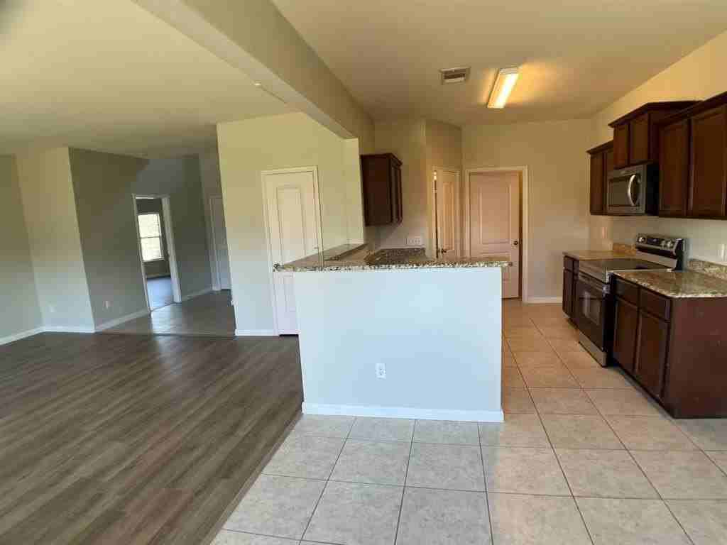 312 Magnolia Dr - Photo 3 of 14