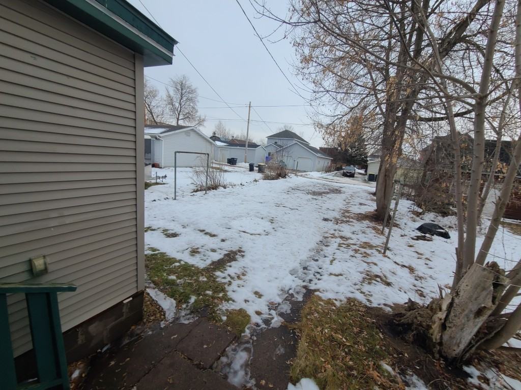 311 3rd Ave E - Photo 5 of 15