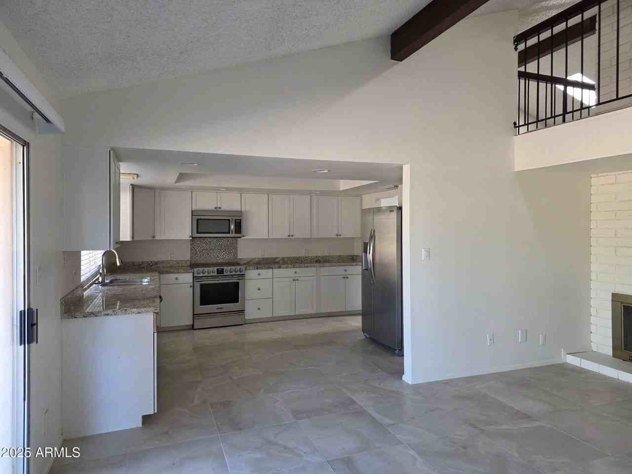 1650 W Kiowa Ave - Photo 2 of 5