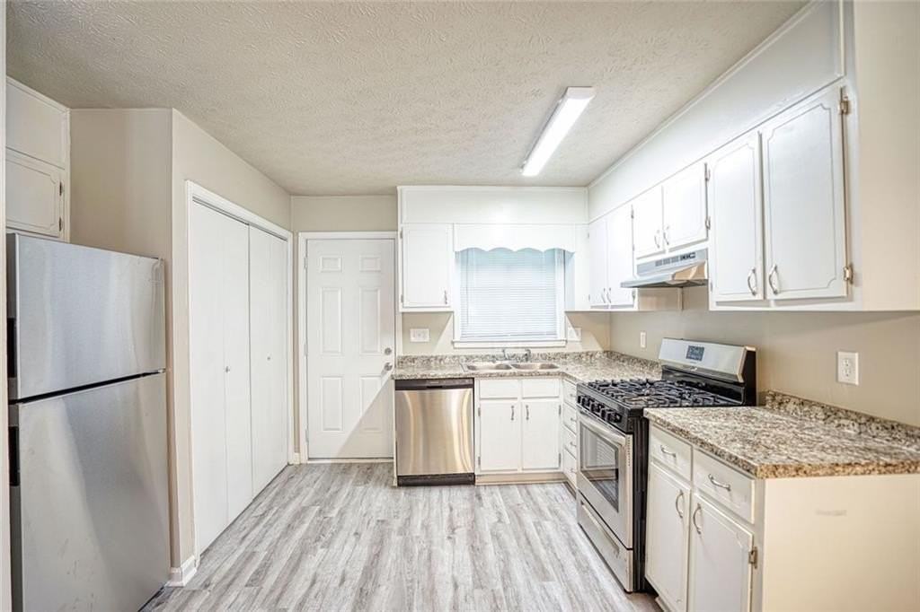 1516 Pine Cone Ln Nw - Photo 4 of 7