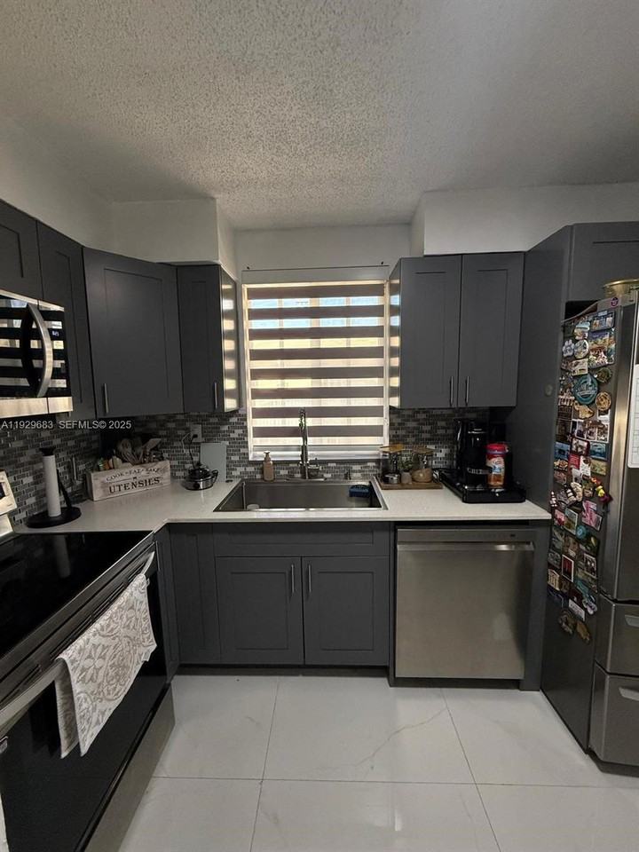 6195 Nw 186th St #402 - Photo 7 of 8