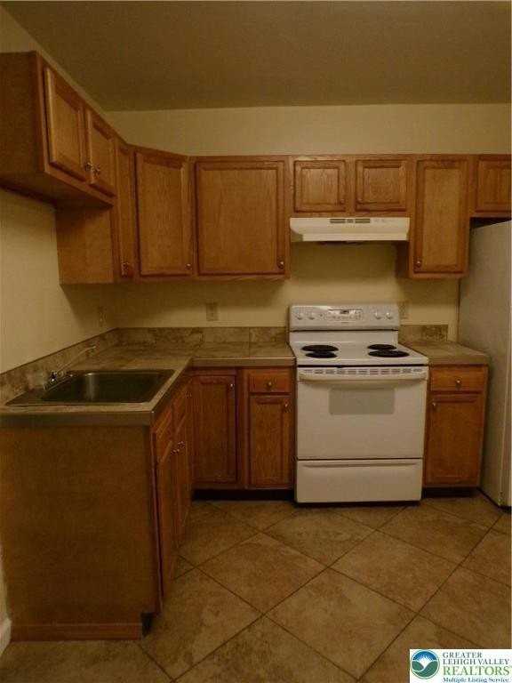 1624 1/2 Utica St - Photo 4 of 11