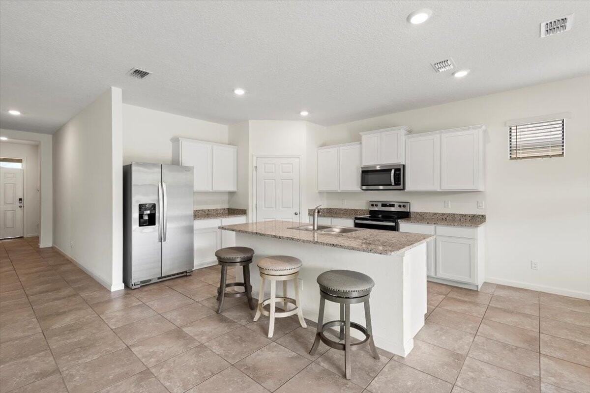 6259 Nw Regent St - Photo 6 of 29