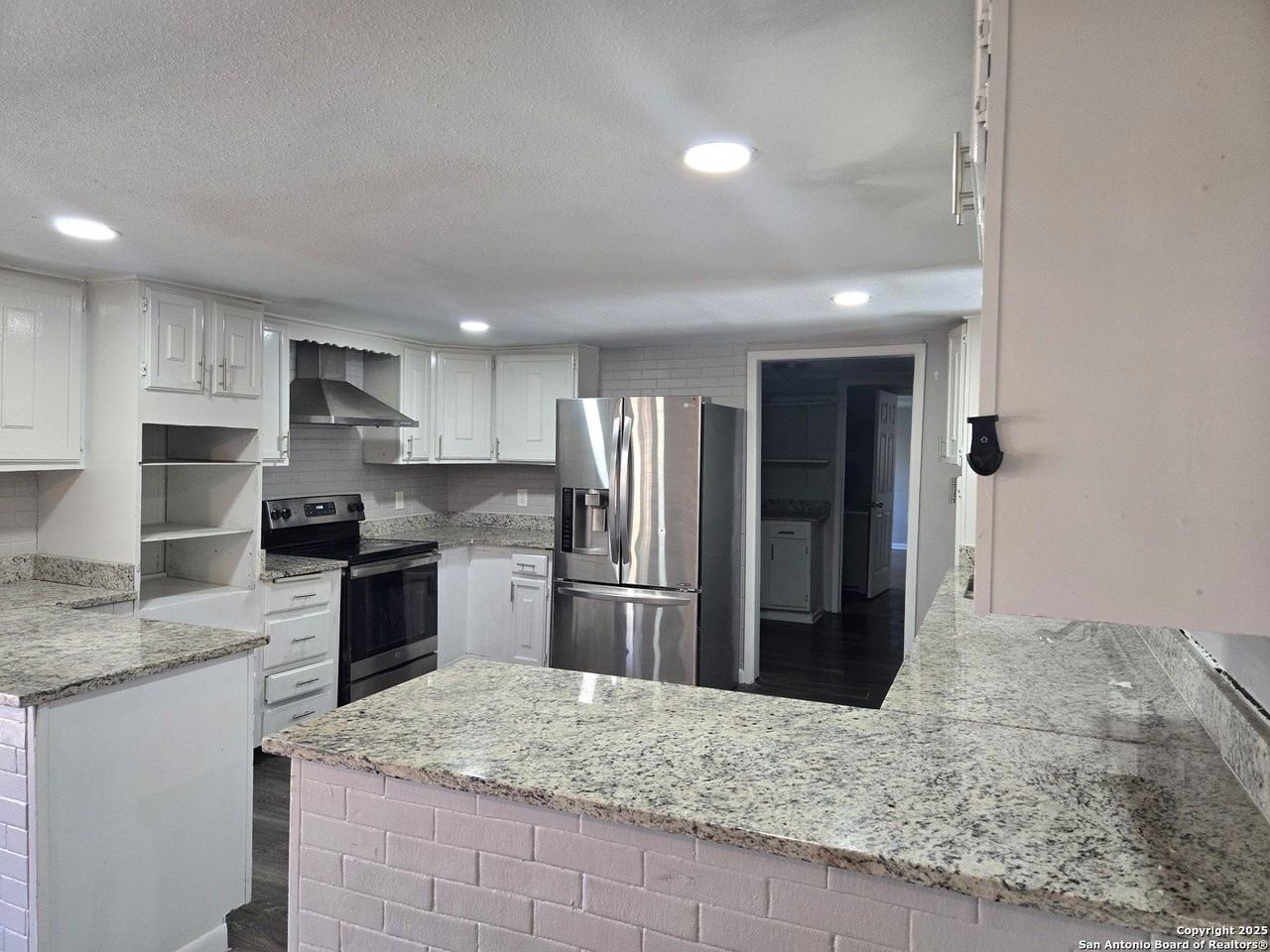 303 Avenue D - Photo 2 of 5