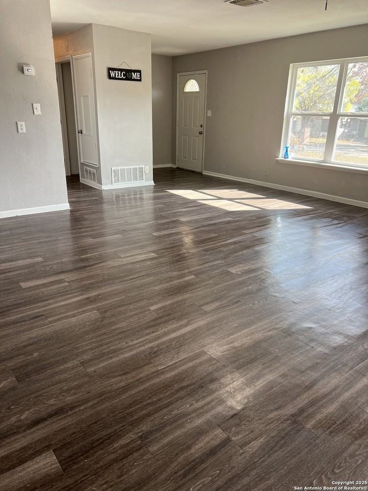 303 Avenue D - Photo 3 of 5