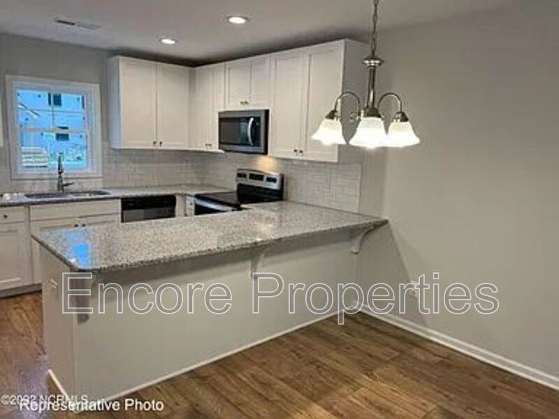 242 S Raleigh St - Photo 2 of 4