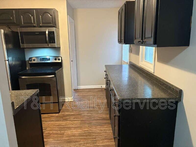 8207 E 50th St - Photo 7 of 22