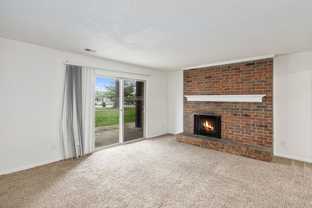 Welcome to The Bluffs – Comfort, Convenience & Value in the Heart of Gladstone - Photo 1 of 1