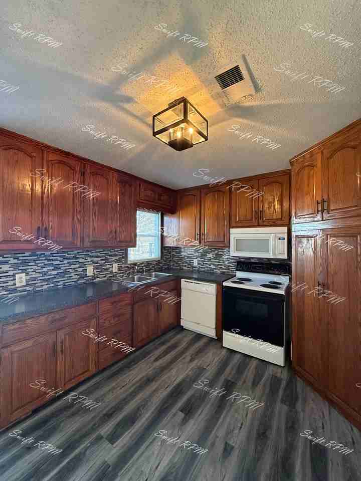 11312 W 67th Ter #1 - Photo 4 of 12