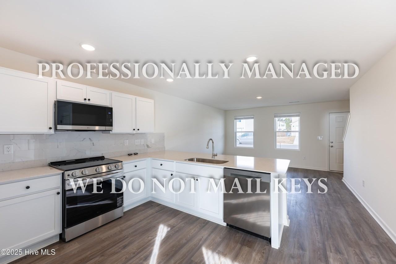 7009 Peppermill Way - Photo 5 of 26