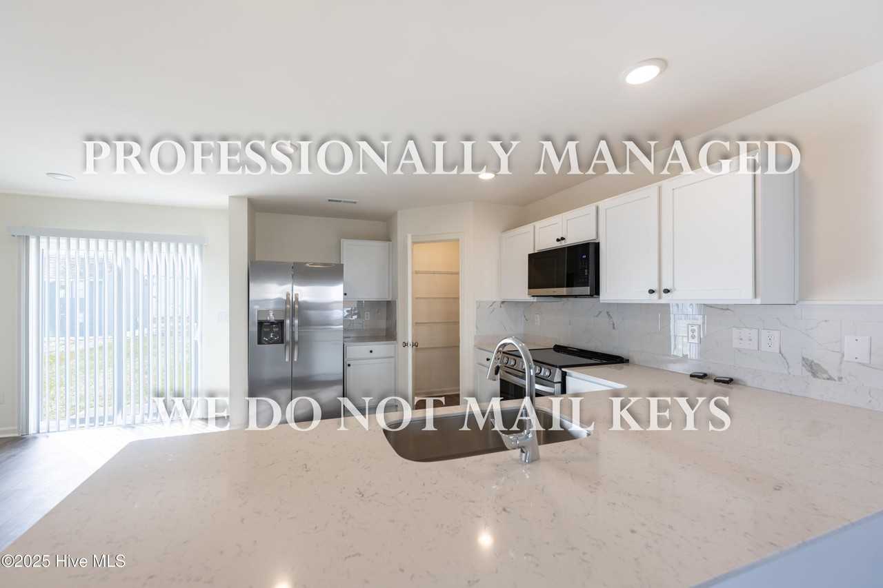 7009 Peppermill Way - Photo 6 of 26