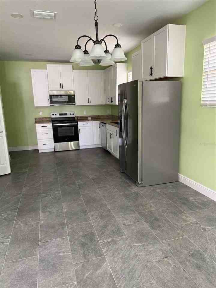 1311 E River Cove St - Photo 5 of 20