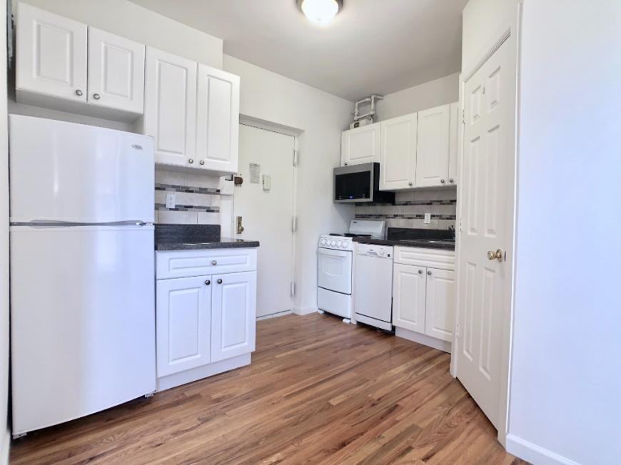 401 E 68th St - Photo 5 of 7