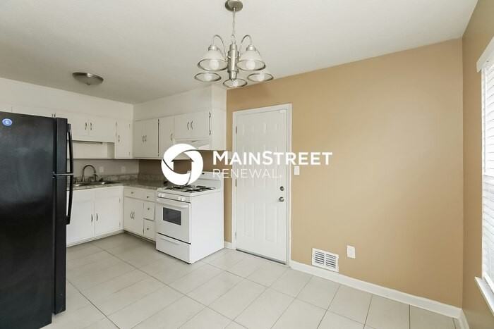 7025 Winkfield Pl - Photo 7 of 16