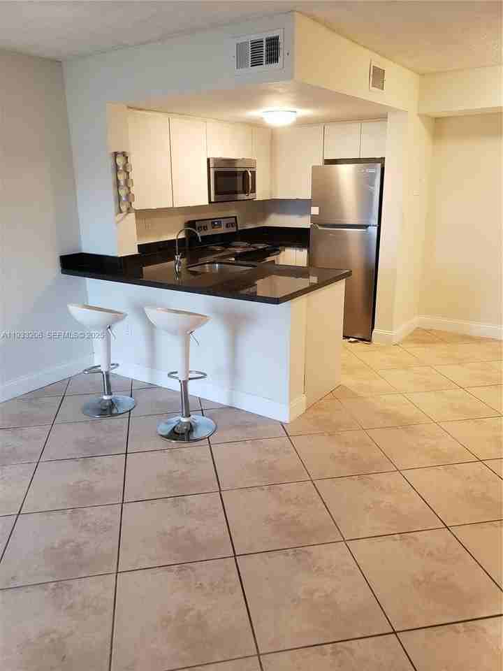 8660 Nw 5th Ter #15-209 - Photo 3 of 20