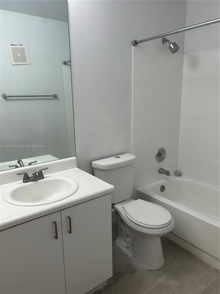 9729 Hammocks Blvd #201E - Photo 2 of 10