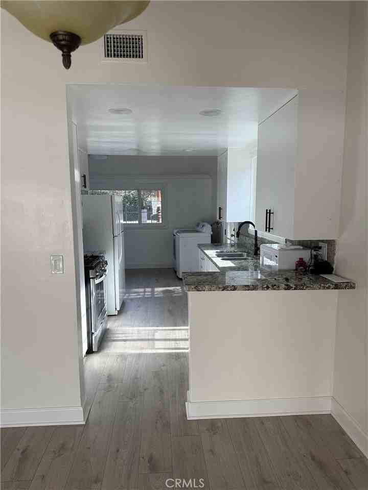 9511 Hayvenhurst Ave - Photo 3 of 10