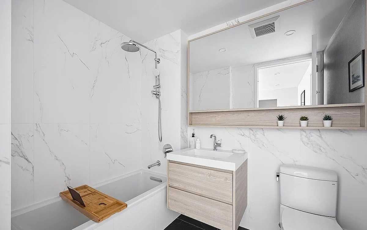 40-22 61st St - Photo 2 of 6