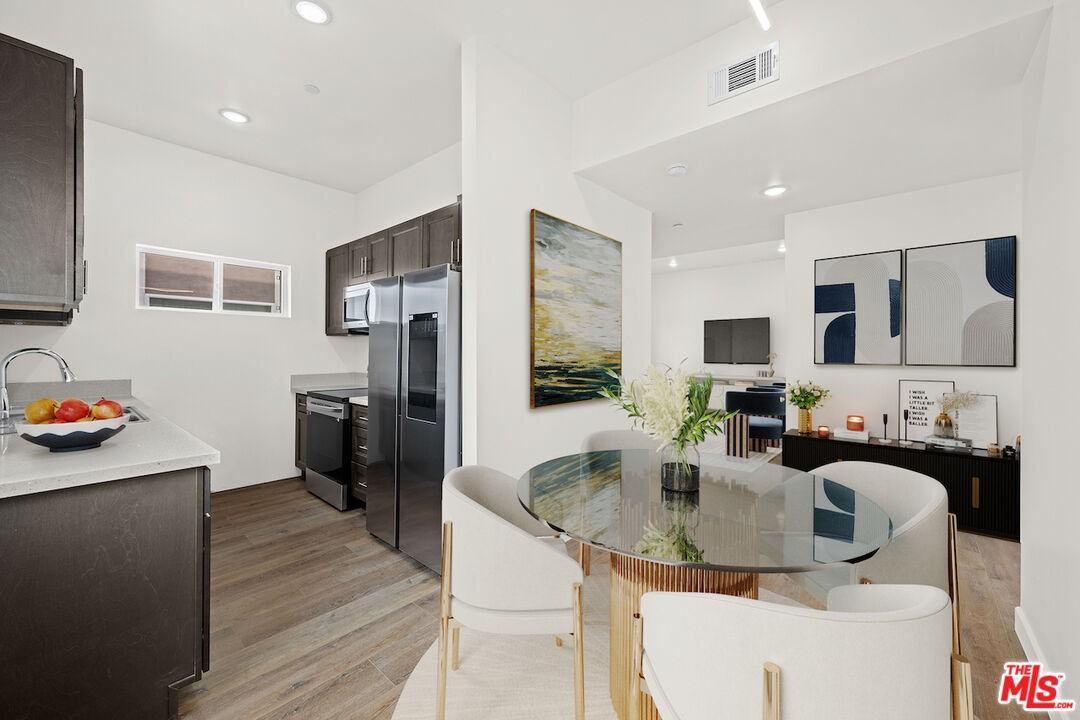 7411 Artesia Blvd #7411-211 - Photo 6 of 10