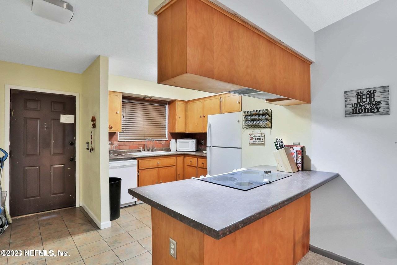 11608 Dunes Way Dr N - Photo 3 of 16