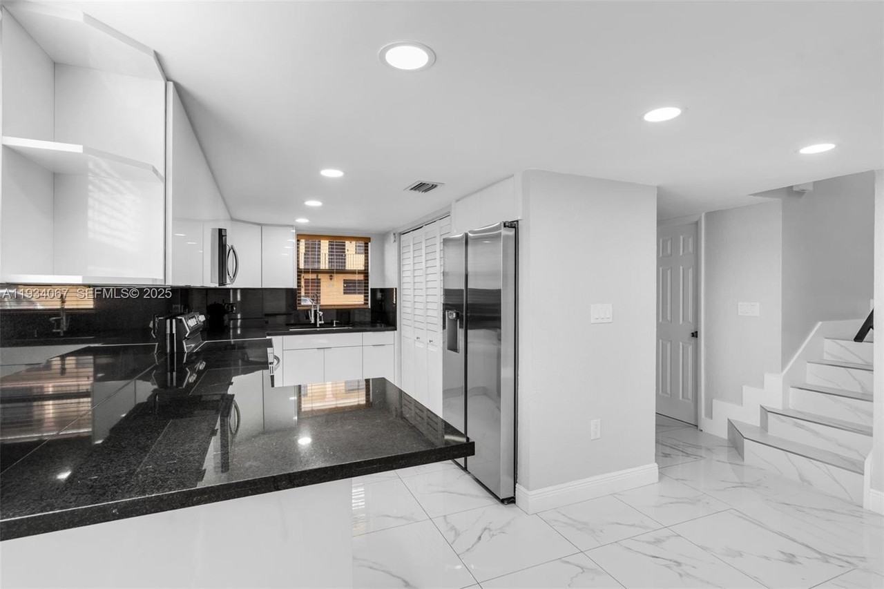 5061 W 12th Ln - Photo 2 of 34