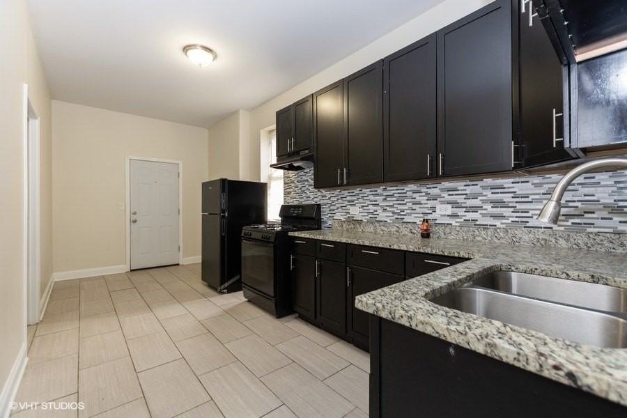 7642 S Normal Ave Apt 1 #1 - Photo 2 of 12