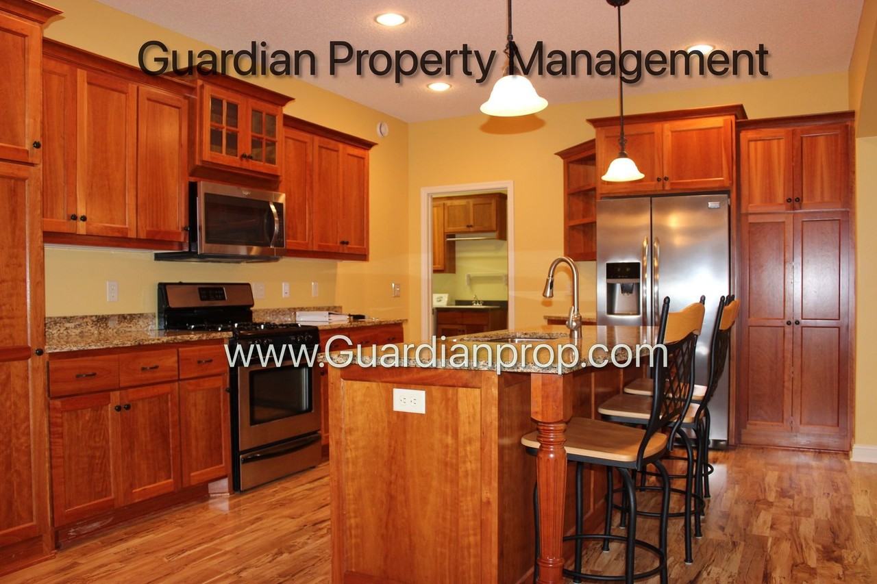 10712 Toledo Ln N - Photo 2 of 25