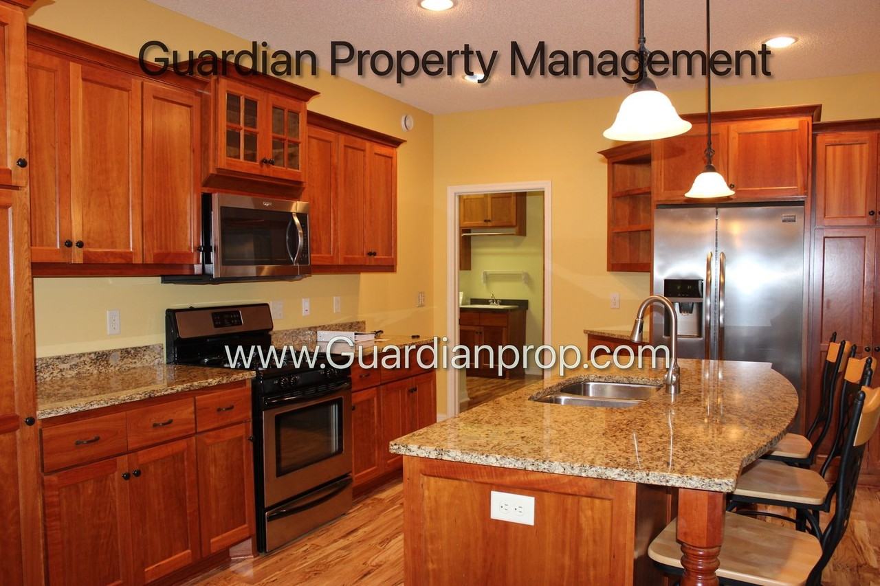 10712 Toledo Ln N - Photo 4 of 25