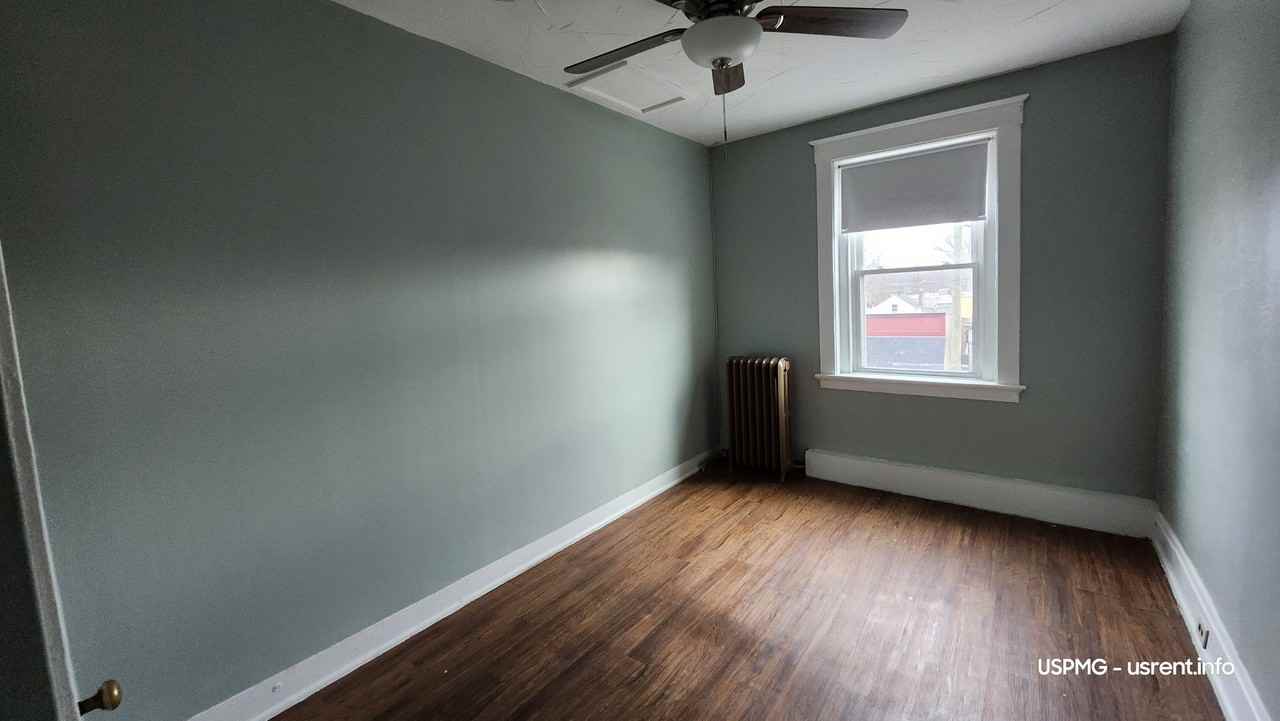 7504 Hamilton Ave - Photo 6 of 11