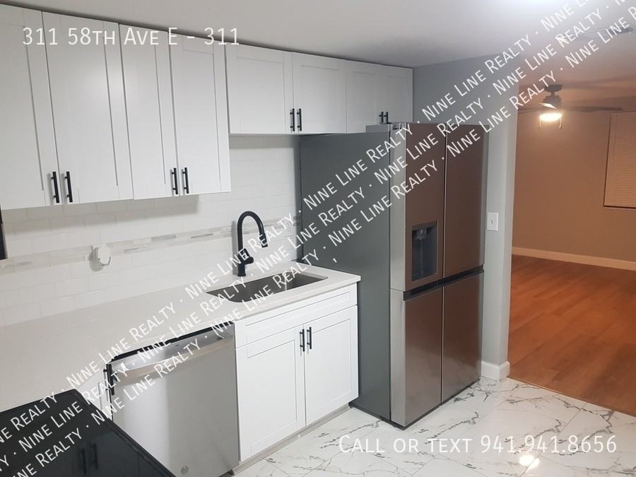 311 58th Ave E #311 - Photo 2 of 31