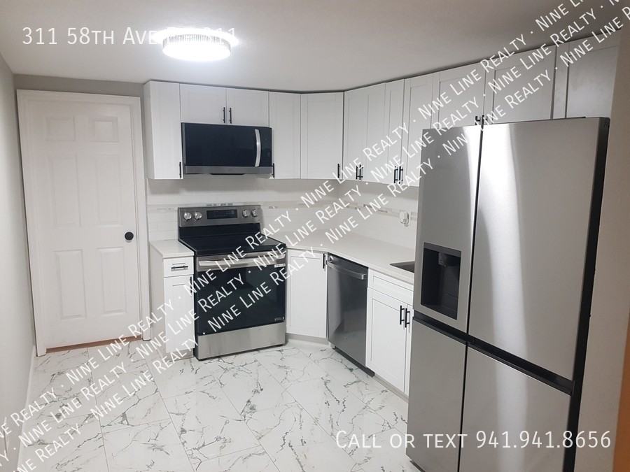 311 58th Ave E #311 - Photo 6 of 31