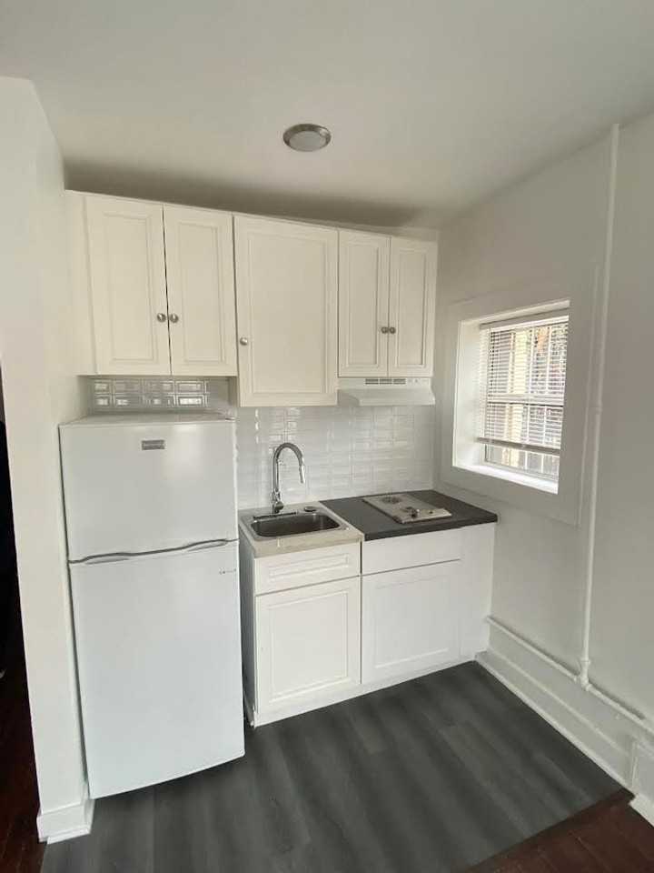 James Wood Properties, LLC - Photo 5 of 6