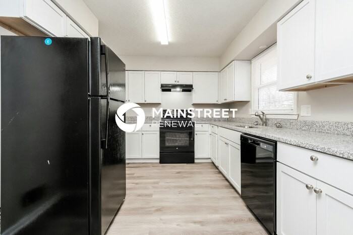 9817 W 56th Ter - Photo 5 of 17