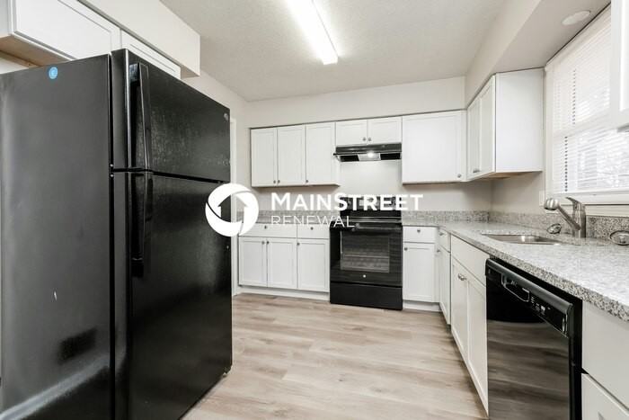 9817 W 56th Ter - Photo 6 of 17