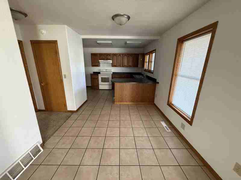 403 W 3rd St - Photo 3 of 10