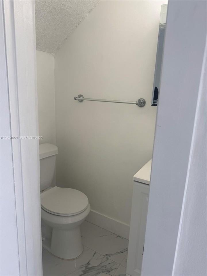 1551 W 7th Ct #23 - Photo 5 of 6